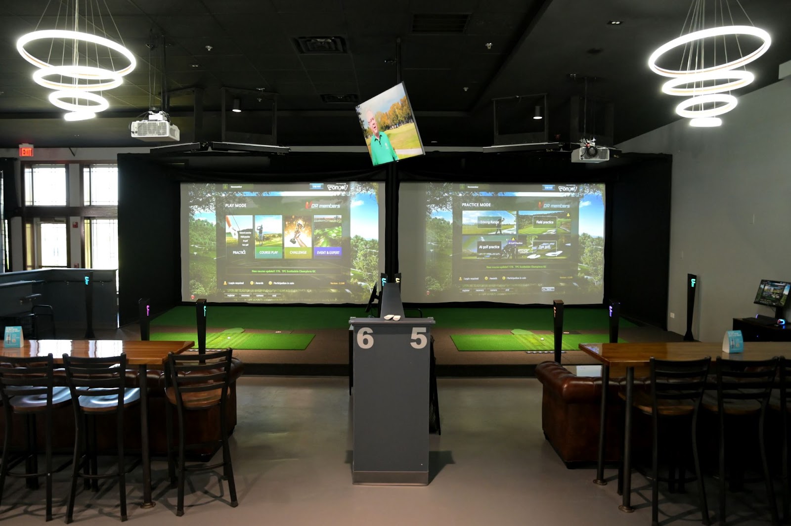Golf simulator in a commercial space