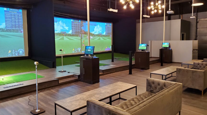 Commercial golf simulator designed and built with Carl's Place Golf Enclosures