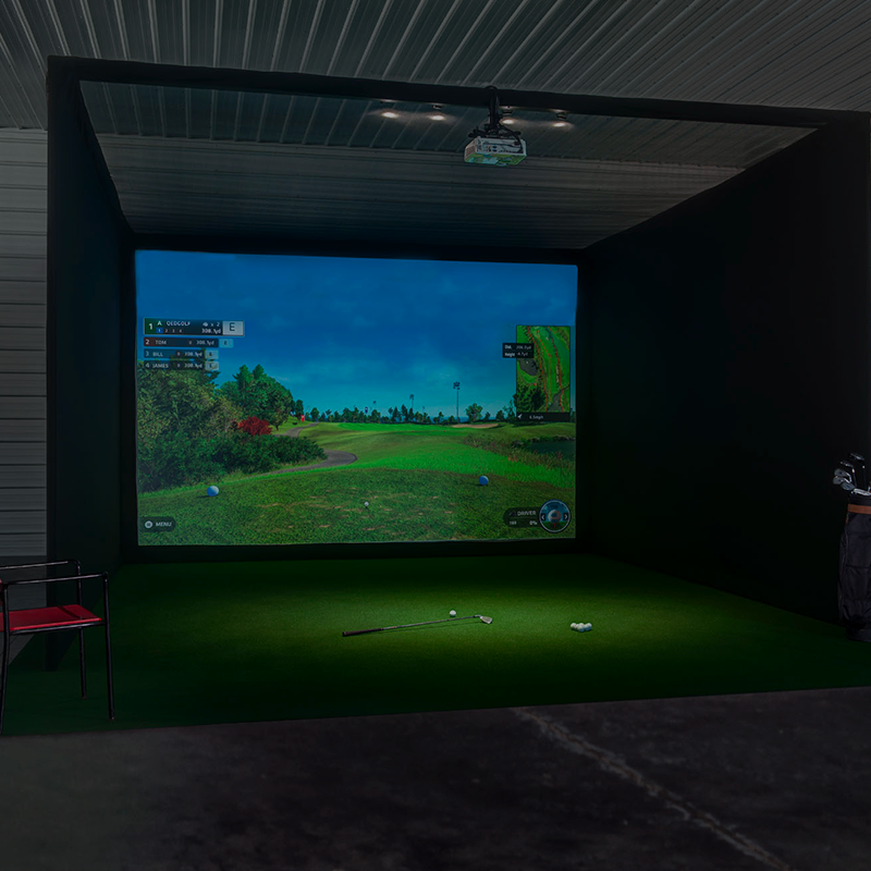 golf simulator with wraparound black golf enclosure and software showing golf course