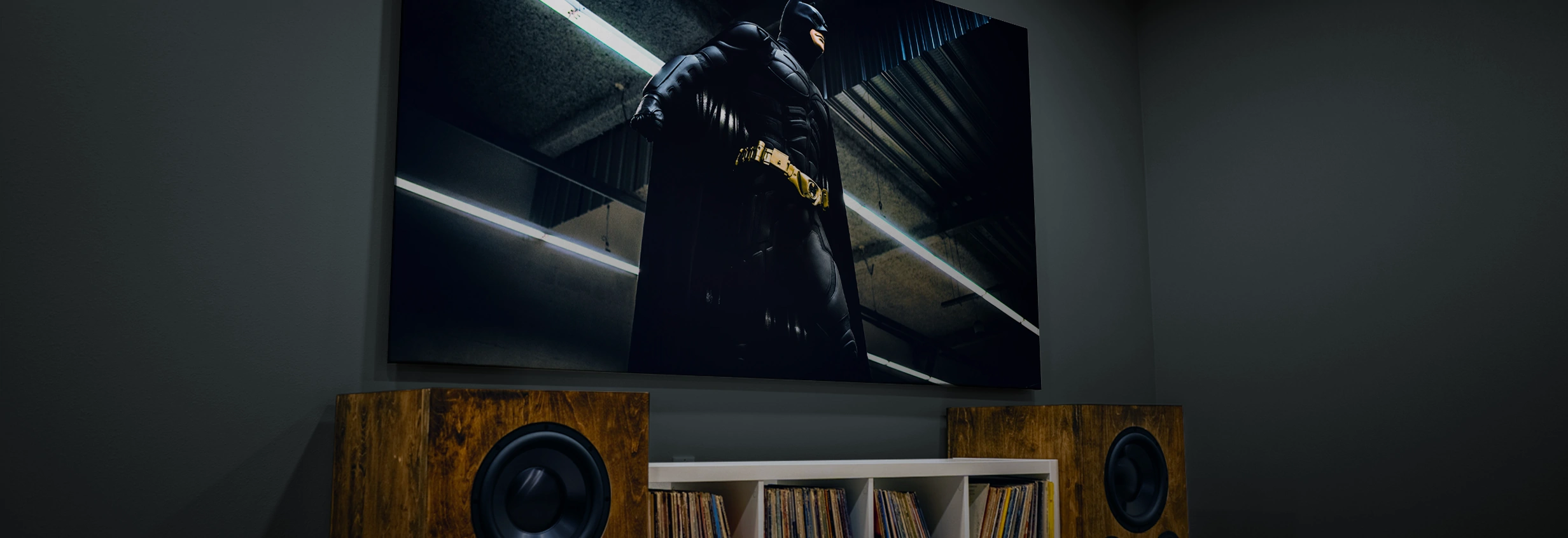 home theater screen showing batman movie